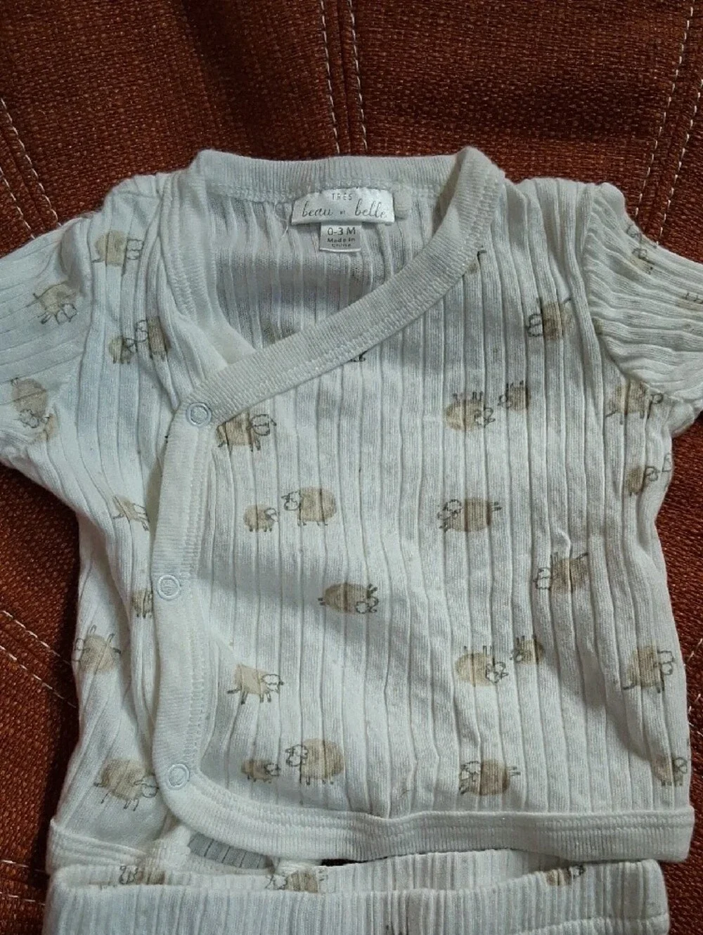 Cream Ribbed Infant Footed One-Piece with Tan Animal Print